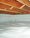 a moisture barrier installed on the walls and floors of a crawl space in Bruceton
