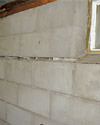 Severely buckling foundation walls in a home in Havelock in need of repairs.