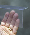 Closeup of a clear plastic covering on a Trent River crawl space block wall