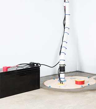 A sump pump installed in Griffith by McInroy Basements Inc.