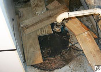 An ugly, clogged sump pump system in Birds Creek, Ontario