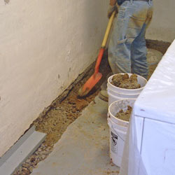 Digging a trench for a French Drain system in Belleville