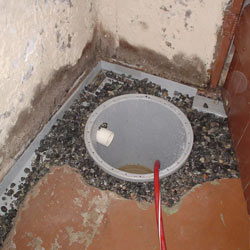 Installing a sump in a sump pump liner in a Picton home