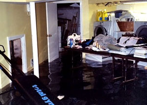 A laundry room flood in Matawatchan, with several feet of water flooded in.