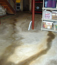 Flooding entering a basement through a floor crack in Marmora