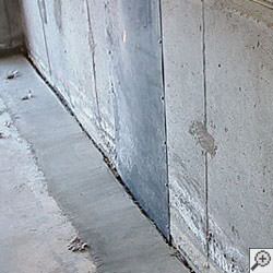 an ugly basement weeping tile drainage system that's clogged and not working in Tweed.
