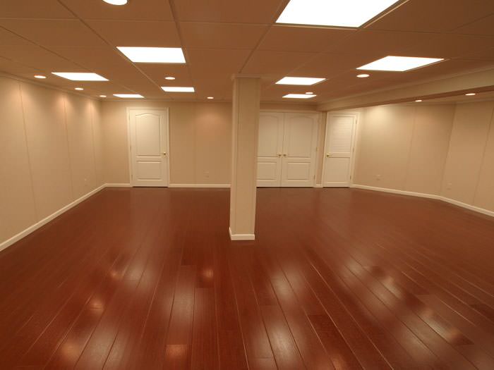 Wood Laminate Basement Floor Finishing Warranted Flooring Rosewood Faux Wood Basement Flooring For Finished Basements In Belleville Waterproof