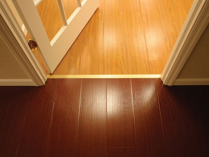 Wood Laminate Basement Floor Finishing Warranted Flooring Wood Basement Flooring Design In A Birds Creek Renovation